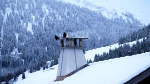 Workation Apartments - 24-7 Self-Checkin - Hotel Postigliun Sedrun durante l'inverno