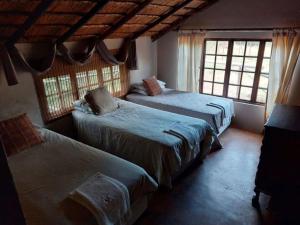 Postel nebo postele na pokoji v ubytování Tumuga Private Cottage Mokopane