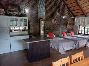 Kuchyň nebo kuchyňský kout v ubytování Tumuga Private Cottage Mokopane + 13 fotografií