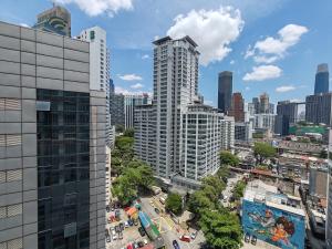 an aerial view of a city with tall buildings at 9 Changkat Jalan Alor Bukit Bintang Pavilion KLCC in Kuala Lumpur