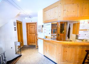 Cucina o angolo cottura di Workation Apartments - 24-7 Self-Checkin - Hotel Postigliun Sedrun