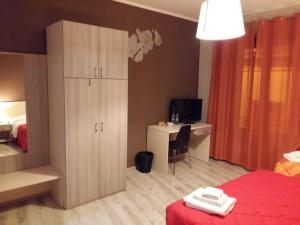 Postel nebo postele na pokoji v ubytování B&B Al Centro