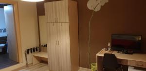 TV a/nebo společenská místnost v ubytování B&B Al Centro