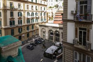 an aerial view of a courtyard in a city with buildings at Luxury apartment in Naples in Naples