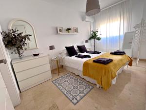 Ένα ή περισσότερα κρεβάτια σε δωμάτιο στο La Pera Jaén