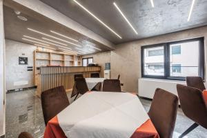 a conference room with a table and chairs at Relax Inn Hotel Durres in Durrës