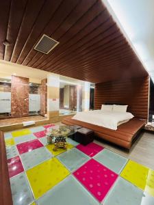 Postel nebo postele na pokoji v ubytování Walker Hotel - Chengde