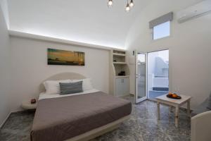 a bedroom with a large bed in a room at Casa Evgenia in Pyrgos