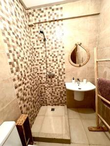 Ванная комната в Cosy et luxueux appartement in gueliz