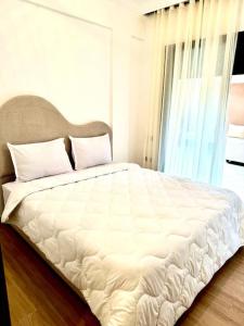 Кровать или кровати в номере Cosy et luxueux appartement in gueliz