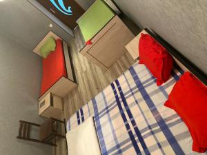 an overhead view of a bedroom with two beds at ARTISHA TRAVEL TBILISI in Tbilisi City