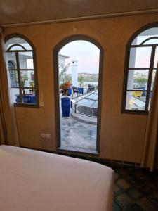 Ένα ή περισσότερα κρεβάτια σε δωμάτιο στο L'Oum Errebia +61 φωτογραφίες