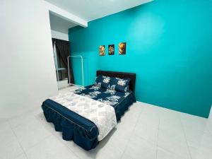 Katil atau katil-katil dalam bilik di Mutiara Homestay at Emerald Avenue Brinchang