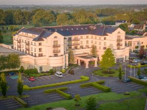 an aerial view of a building with a parking lot at Knightsbrook Hotel & Golf Resort in Trim