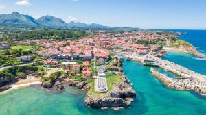 an aerial view of a town on the ocean at Casa Lula 3 Pendueles LLanes in Llanes