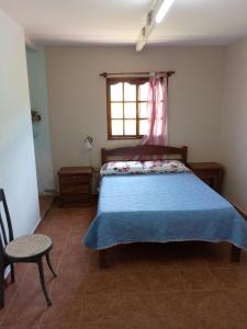 Säng eller sängar i ett rum på Quinta Gutierrez