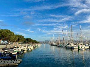 a group of boats docked in a harbor at Casa Rural Passivhaus Kostoenea in Hondarribia