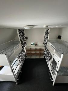 Postel nebo postele na pokoji v ubytování Hostel John Galt