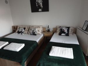 Postel nebo postele na pokoji v ubytování Apartment Božur