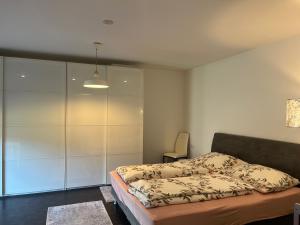 Ένα ή περισσότερα κρεβάτια σε δωμάτιο στο Apartment Bergliebe
