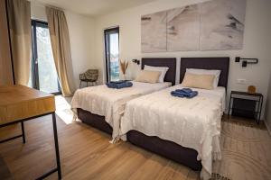 En eller flere senge i et værelse på Villa Mia Stella + 72 billeder