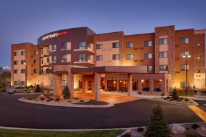 a rendering of the front of a hotel at Courtyard by Marriott Lehi at Thanksgiving Point in Lehi