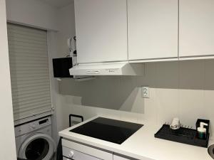 Kuchyň nebo kuchyňský kout v ubytování Small Home Fuengirola