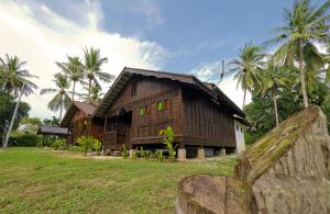 Afbeelding uit fotogalerij van Kampung Tok Lembut Vacation Home in Pantai Cenang