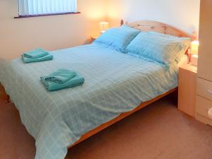 Una cama o camas en una habitación de Eilean Beag