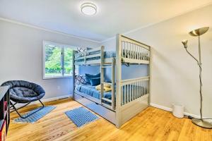 a room with a bunk bed and a chair at Oasis Hot Tub Pool Game Room in Saylorsburg +47 photos