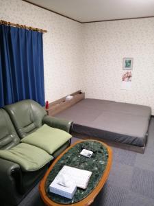 Ένα ή περισσότερα κρεβάτια σε δωμάτιο στο Minpaku Yamamoto - Vacation STAY 13870