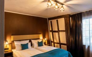 Postel nebo postele na pokoji v ubytování Trip Inn Hotel Sachsenhausen