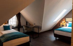 Postel nebo postele na pokoji v ubytování Trip Inn Hotel Sachsenhausen