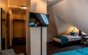Postel nebo postele na pokoji v ubytování Trip Inn Hotel Sachsenhausen
