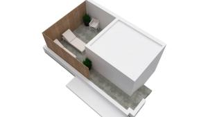 a rendering of a room with a table and chairs at Papikinou Bay Suites in Adamantas