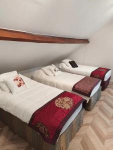 En eller flere senge i et værelse på Belle maison de Campagne Confortable 17 couchages