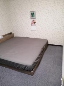 Krevet ili kreveti u jedinici u objektu Minpaku Yamamoto - Vacation STAY 13870