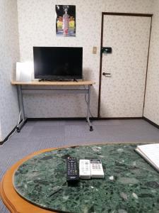 TV i/ili zabavni centar u objektu Minpaku Yamamoto - Vacation STAY 13870