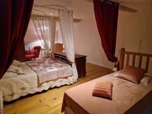 Katil atau katil-katil dalam bilik di Charmante petite grange - 5 Couchages