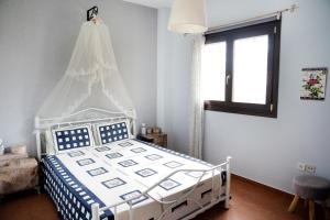 Postel nebo postele na pokoji v ubytování Artistic 1 apartment
