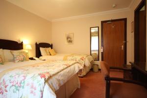Postel nebo postele na pokoji v ubytování Strathburn Hotel Inverurie by Compass Hospitality