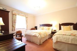 Postel nebo postele na pokoji v ubytování Strathburn Hotel Inverurie by Compass Hospitality