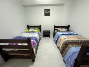 Postel nebo postele na pokoji v ubytování Edificio Solarium