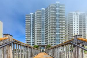 a bridge with two tall buildings in the background at Palacio Condominiums II in Perdido Key