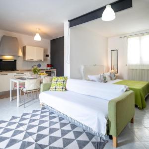 Postel nebo postele na pokoji v ubytování Casa Pagani Loft Noto mare