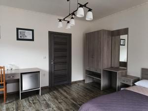 Postel nebo postele na pokoji v ubytování Готель Ципа + 29 fotografií