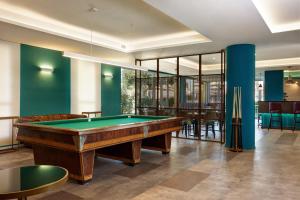 a billiard room with a pool table at Hotel Roma Tor Vergata in Tor Vergata