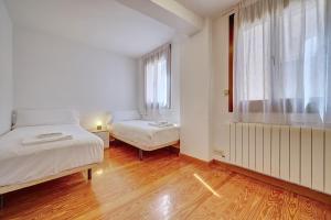 Ένα ή περισσότερα κρεβάτια σε δωμάτιο στο Apartamento La Puerta de Laurel
