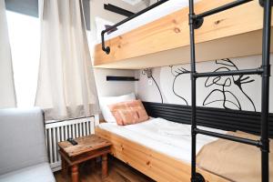 Ein Bett oder Betten in einem Zimmer der Unterkunft Self check in City Hostel Nordstern