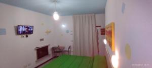 TV a/nebo společenská místnost v ubytování Guesthouse Serena